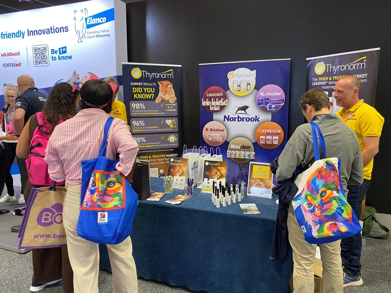 A photo of delegates at the Thyronorm booth at the World Feline Congress
